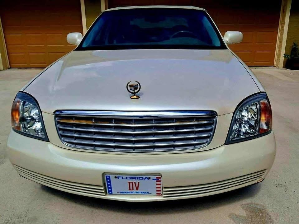 White Cadillac headlight companion photo